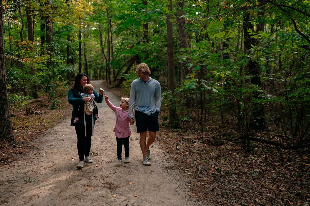 A family walking the Noland Trail in Newport News.