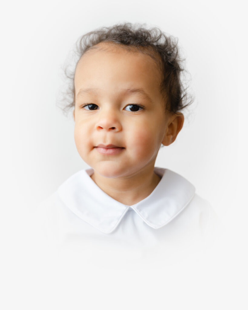 Little boy wears a classic collard shirt for Heirloom Portrait Photography