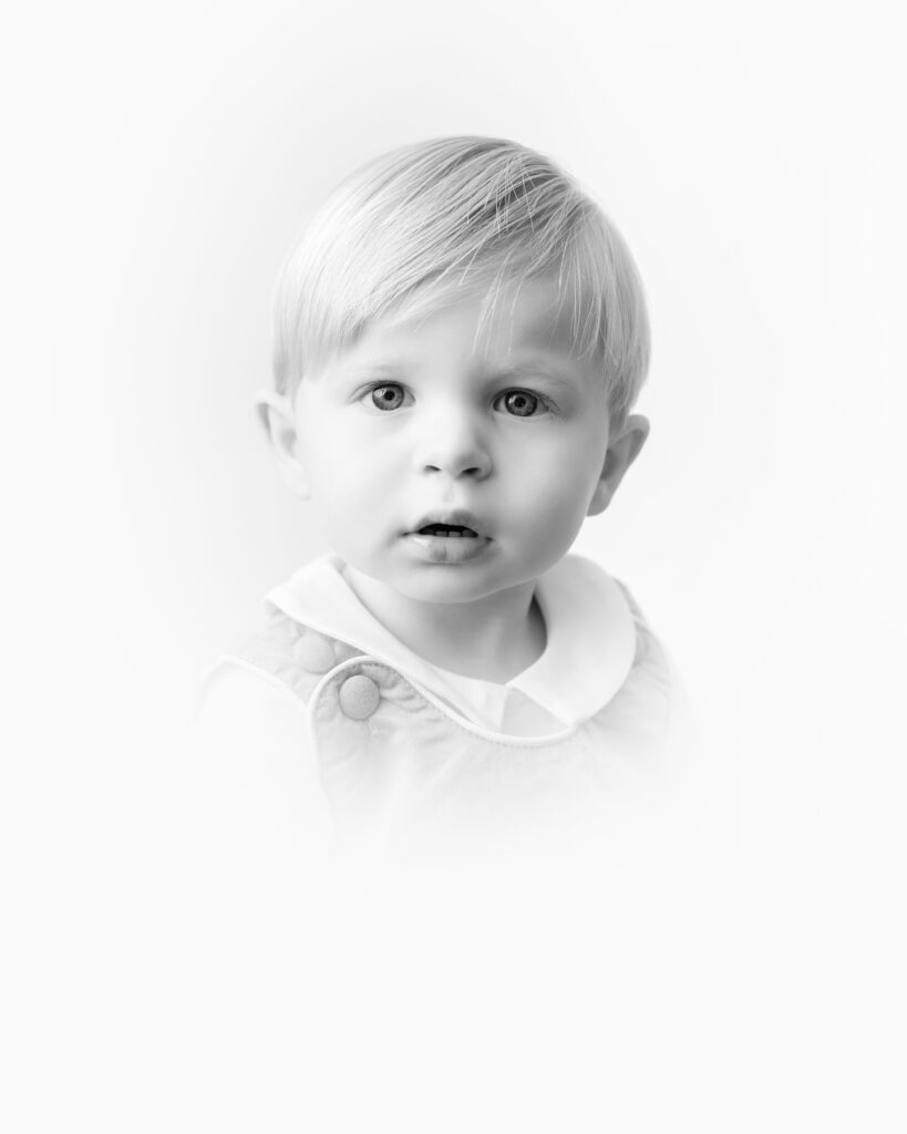 Black and white heirloom portrait of a little boy.