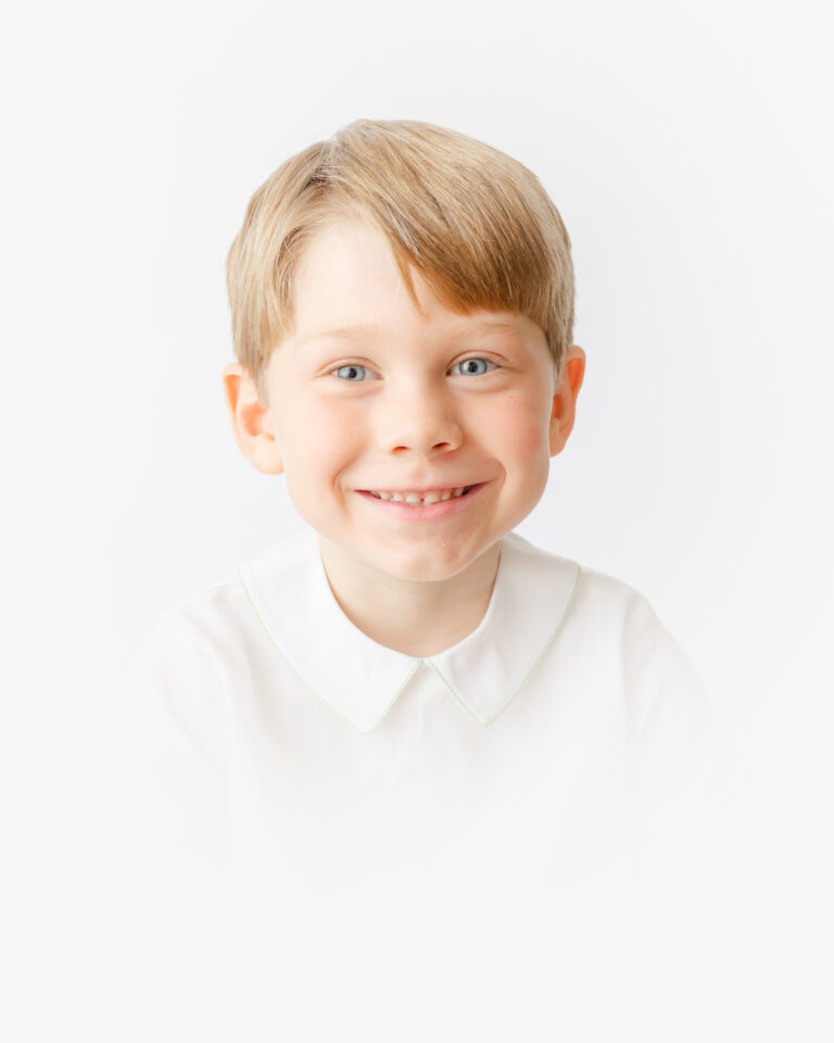 Boy smiles during his Virginia Beach Heirloom Portraits Session.
