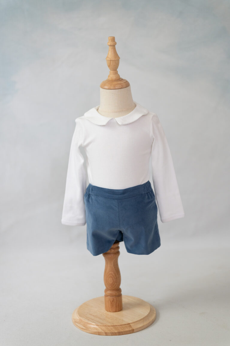 Shop Theodore cordaroy shorts and peater pan collared onsie.