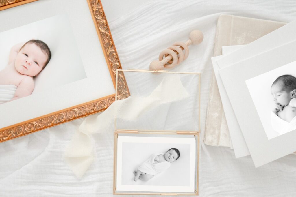 Gold frame and newborn prints