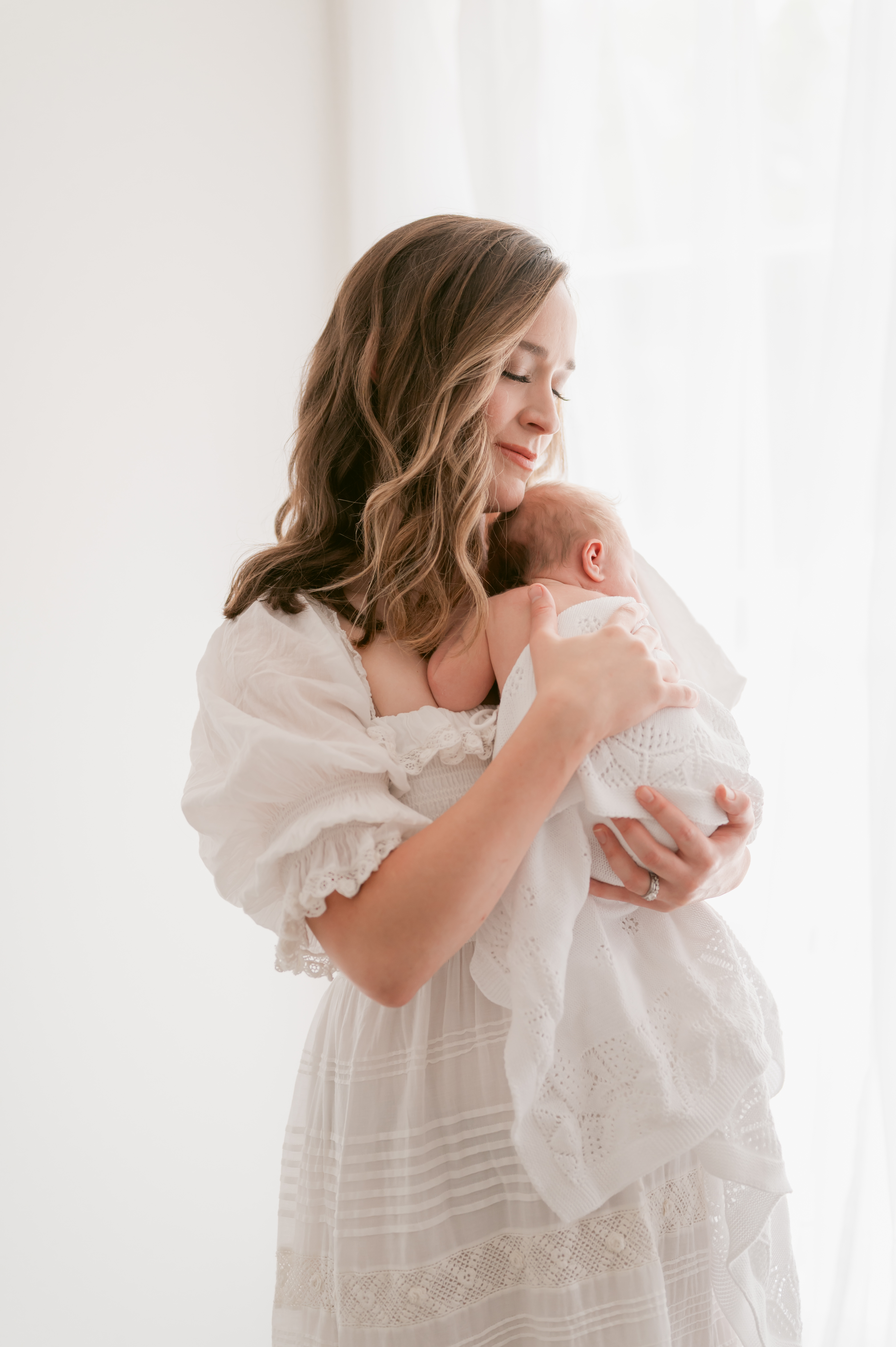 norfolk-newborn-photographer-studio-mom-holding-baby-172