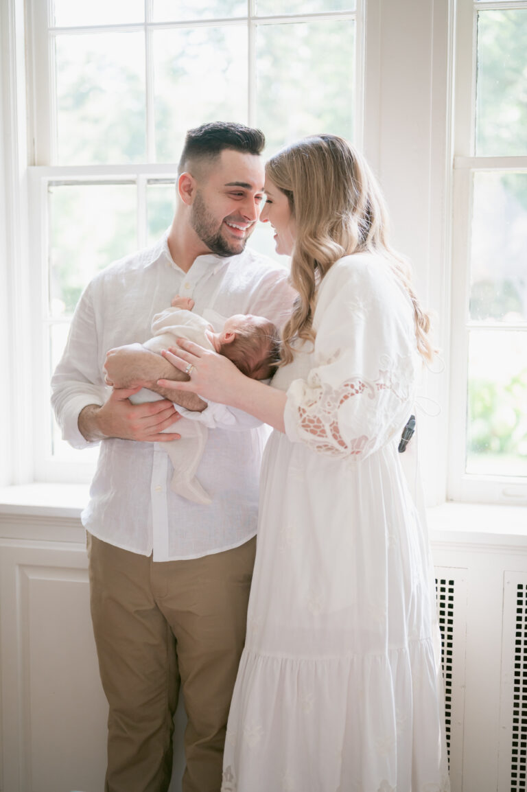 norfolk-newborn-photography-in-home-mom-and-dad-with-baby-077