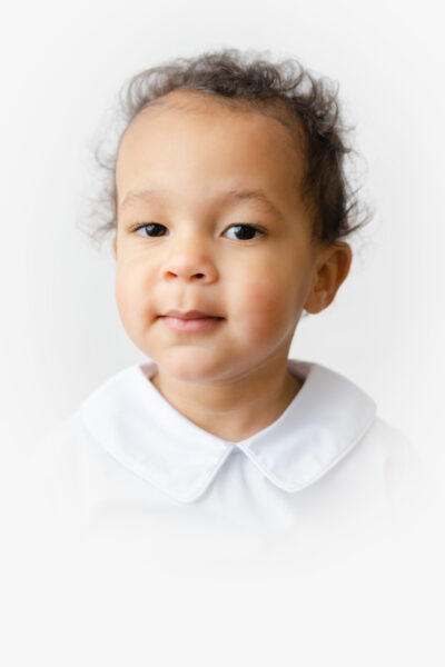 Little boy wears a classic collard shirt for Heirloom session with Williamsburg Virginia Photographer, Dreama Spence.